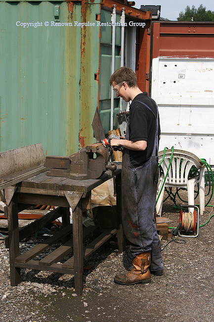 Chris Bodell cleaning cab panelling